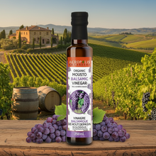 Load image into Gallery viewer, Bottle of organic balsamic vinegar with a purple label on a white background